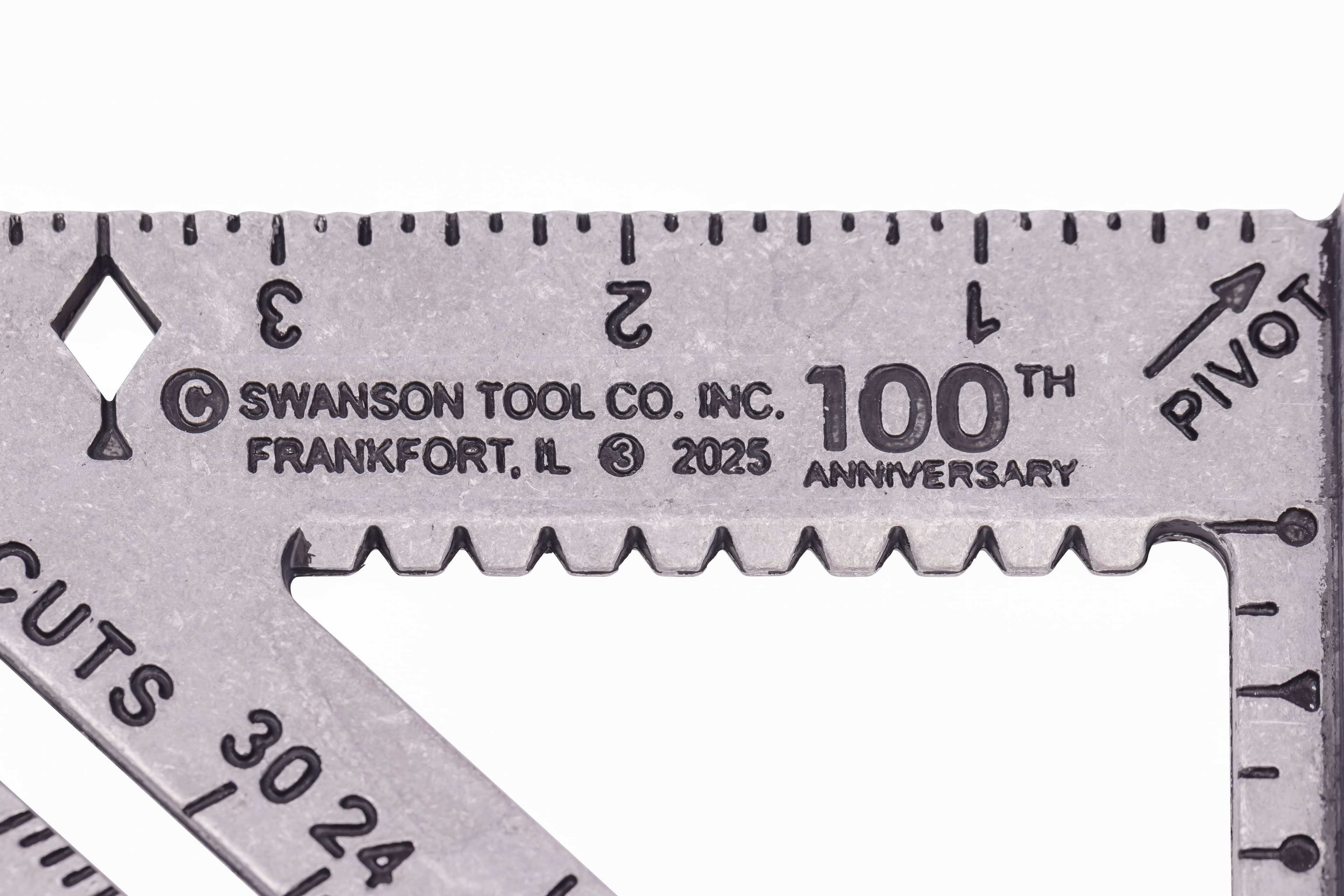Close-up of the deep black-filled gradations on a Swanson Speed® Square.