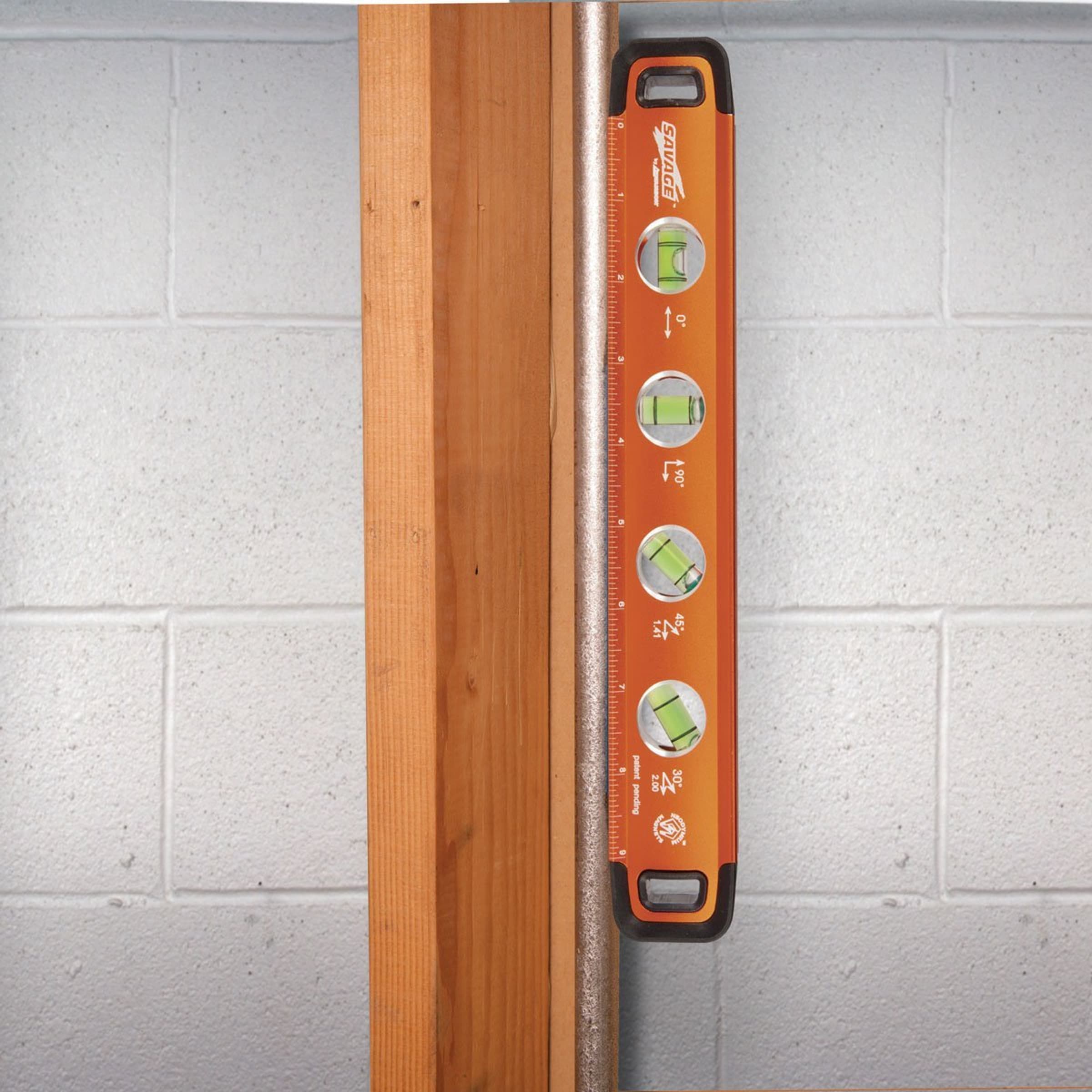 In-application use of the Swanson Savage® 11 in. Torpedo Level on conduit.