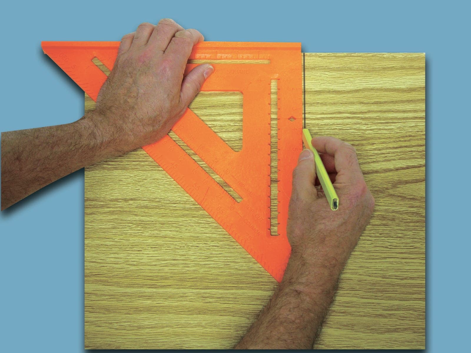 A Swanson Big 12® Speedlite® Square in use on a long piece of lumber, showing its 12 in. reach.