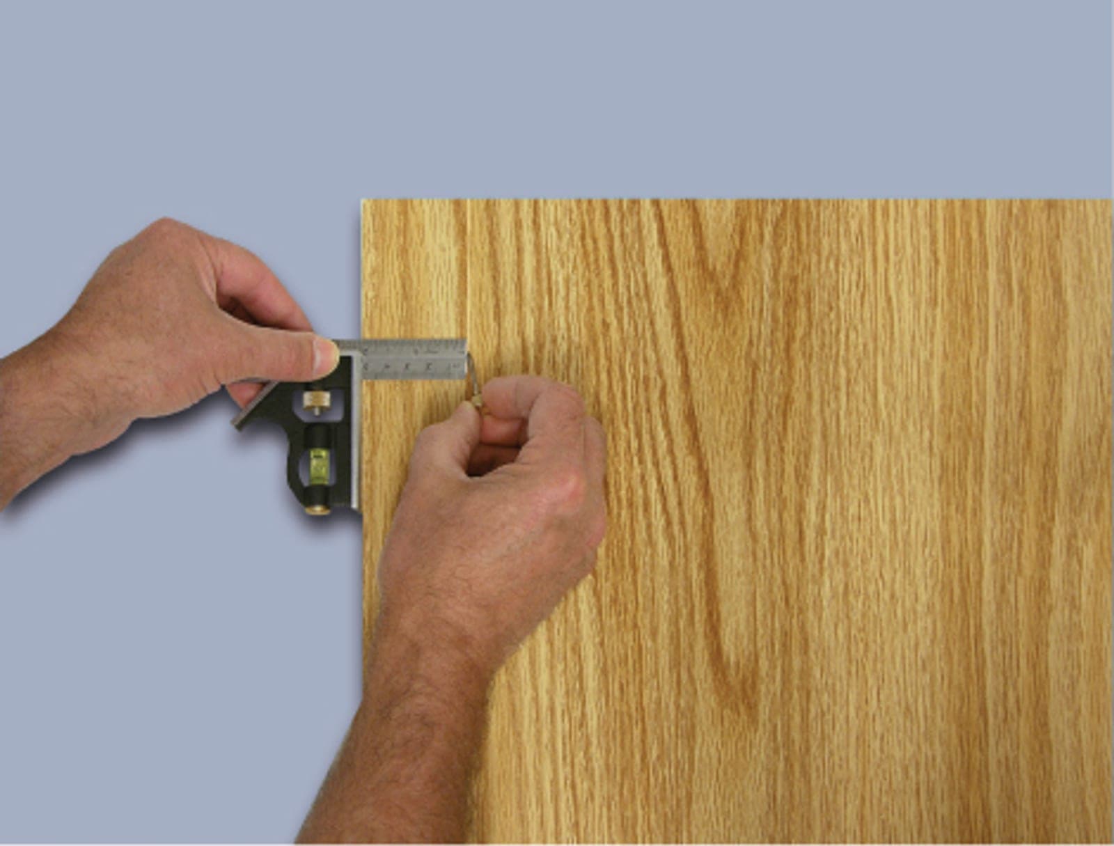 A Swanson TC130 Combo Square in use, gauging a layout on a piece of stock.